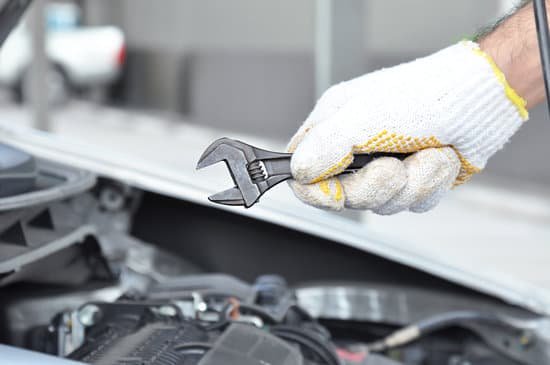 Mechanic holding a spanner