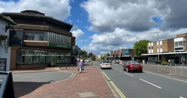Photo of Totton Town Centre shops and cars