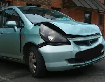 Crasg damaged Honda Jazz car