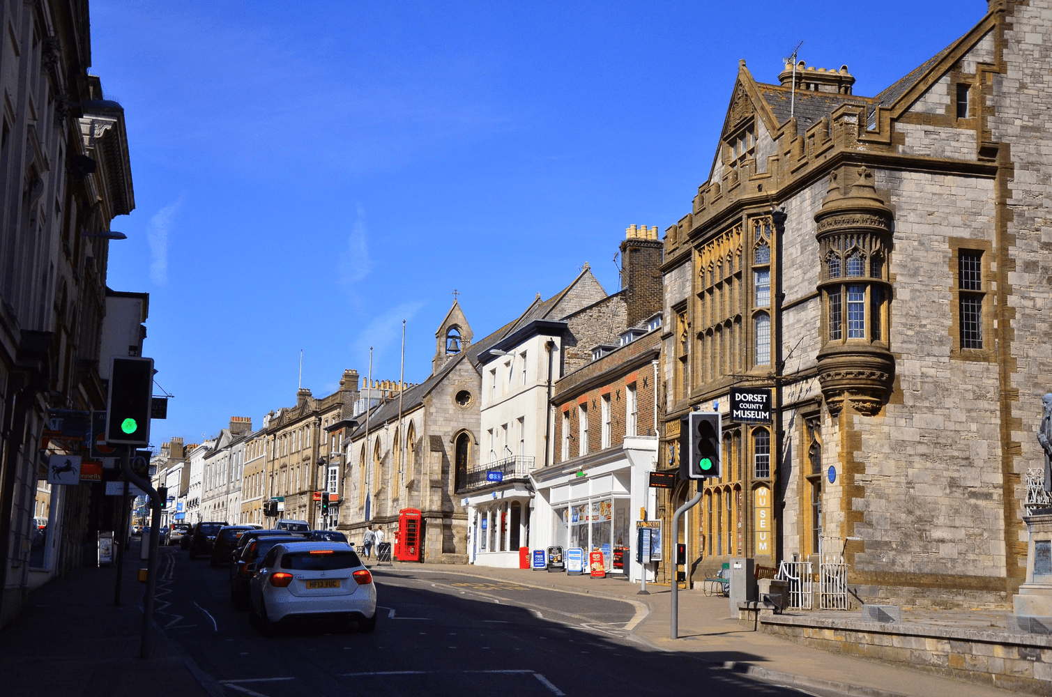Dorset town center photo with rows of shops and old buildings