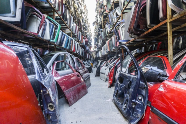 Car parts, mainly doors, being stored at a salvage yard