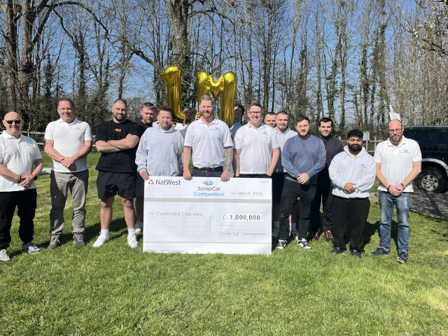Scrap Car Comparison employees celebrate reaching £1m of charitable donations